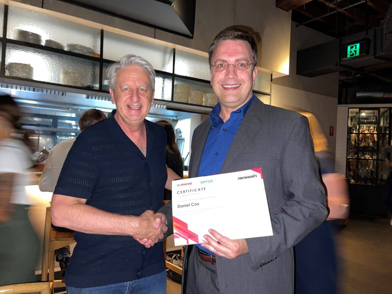 Daniel Cox holds award for Database Migration and Database security work for Comviva